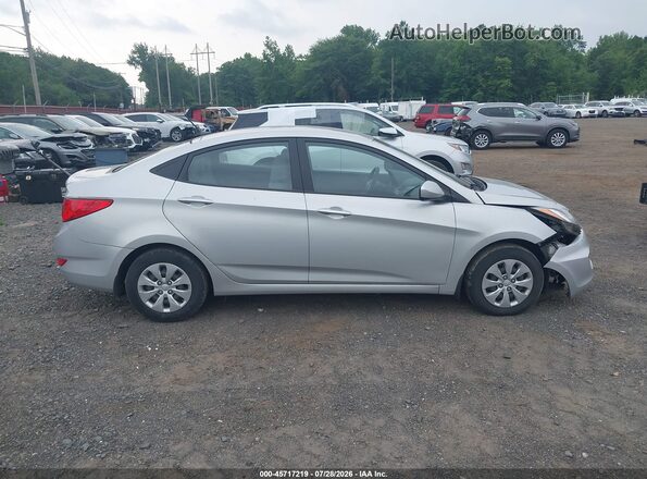KMHCT4AE5GU166888 2016 HYUNDAI ACCENT Gray Vista interior trasera