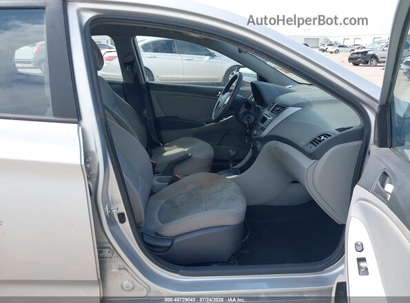 KMHCT4AE6GU011802 2016 HYUNDAI ACCENT Silver Вид салону спереду