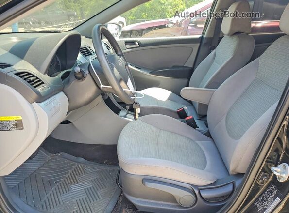 KMHCT4AE8HU352345 2017 HYUNDAI ACCENT Black Front interior view