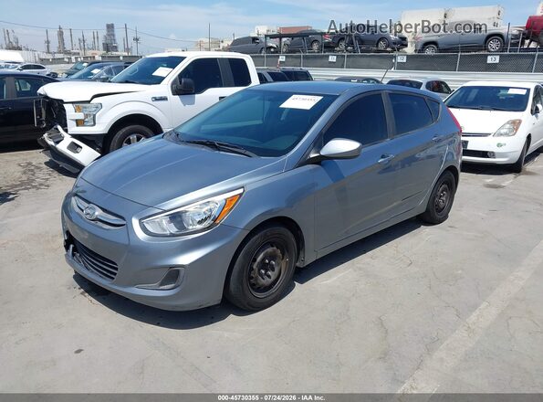 KMHCT5AE0HU359392 2017 HYUNDAI ACCENT Blue Vista tres cuartos delantera izquierda