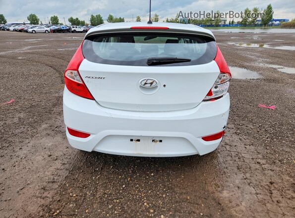 KMHCT5AE1GU292400 2016 HYUNDAI ACCENT White Вид ззаду