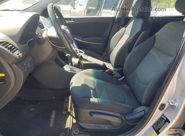 KMHCT5AE1HU344853 2017 HYUNDAI ACCENT Silver წინა სალონის ხედი