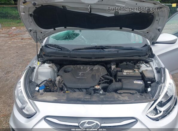 KMHCT5AE2HU335594 2017 HYUNDAI ACCENT Silver Вид ззаду