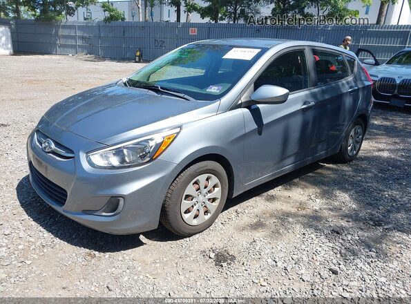 KMHCT5AE2HU355375 2017 HYUNDAI ACCENT Gray წინა მარცხენა ხედი სამი მეოთხედიდან