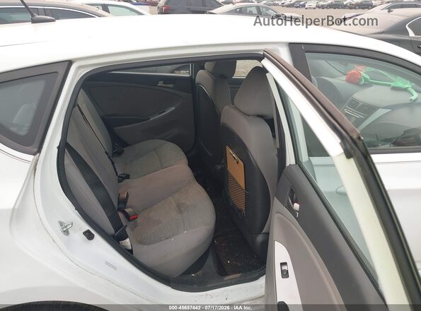 KMHCT5AE5HU335220 2017 HYUNDAI ACCENT White VIN կոդի պիտակի տեսք