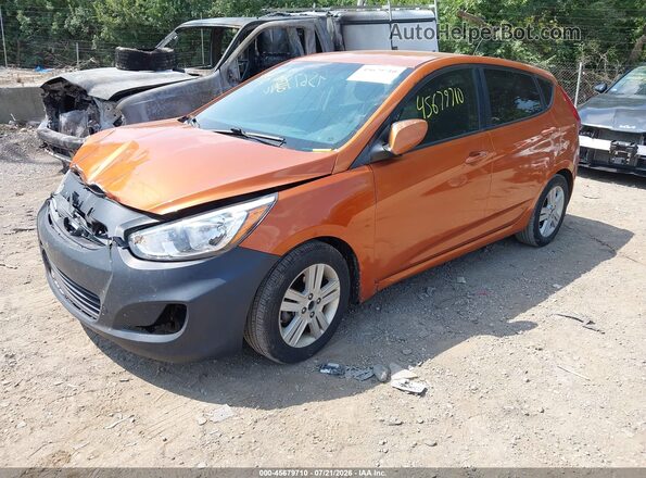 KMHCT5AE6GU244276 2016 HYUNDAI ACCENT Orange Front left