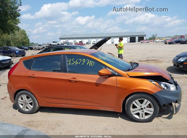KMHCT5AE6GU244276 2016 HYUNDAI ACCENT Orange Rear interior view