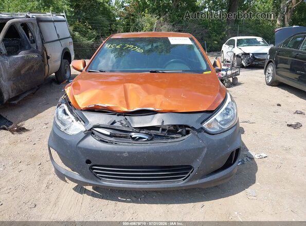 KMHCT5AE6GU244276 2016 HYUNDAI ACCENT Orange Instrument cluster view