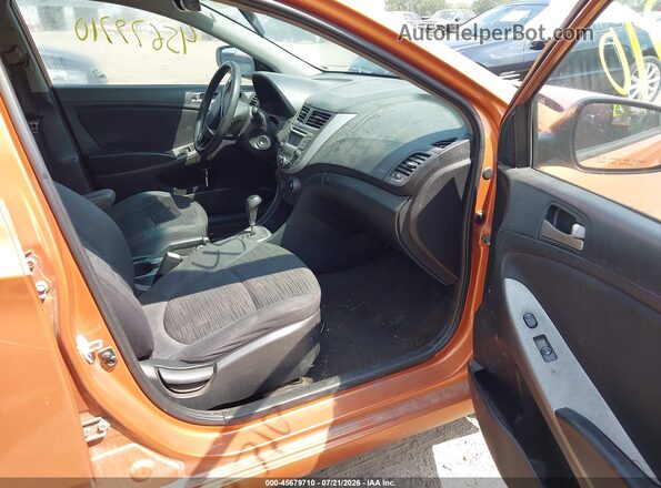 KMHCT5AE6GU244276 2016 HYUNDAI ACCENT Orange Front interior view