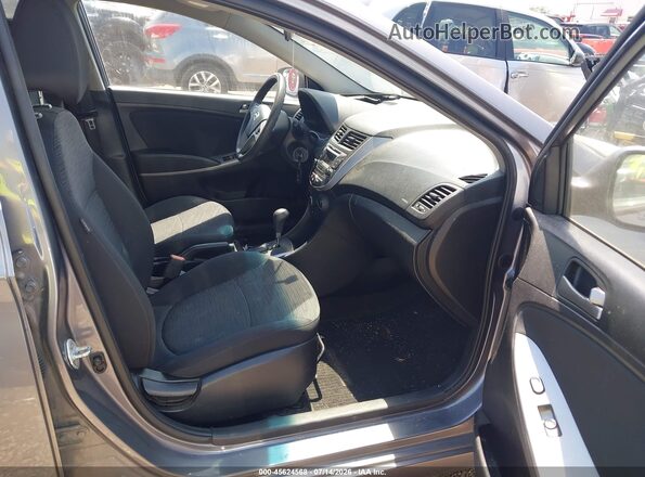 KMHCT5AE7GU268831 2016 HYUNDAI ACCENT Gray Front interior view