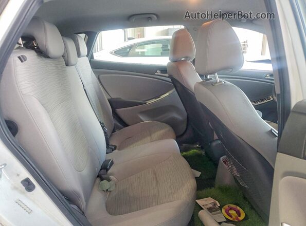 KMHCT5AE7HU319682 2017 HYUNDAI ACCENT White Rear seats view