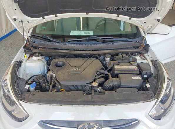 KMHCT5AE7HU319682 2017 HYUNDAI ACCENT White Rear interior view