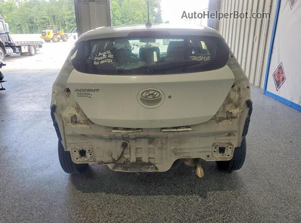 KMHCT5AE7HU319682 2017 HYUNDAI ACCENT White Rear view