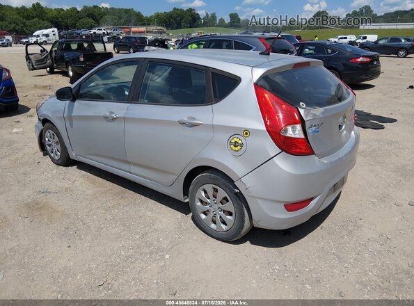 KMHCT5AE7HU335574 2017 HYUNDAI ACCENT Silver Trasero izquierdo