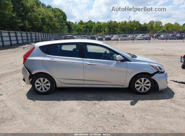 KMHCT5AE7HU335574 2017 HYUNDAI ACCENT Silver Vista interior trasera