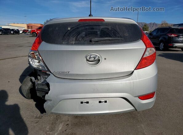 KMHCT5AE9HU312541 2017 HYUNDAI ACCENT Silver Widok z tyłu