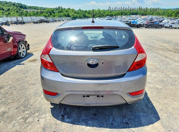 KMHCT5AEXGU254163 2016 HYUNDAI ACCENT Серебряный Вид сзади