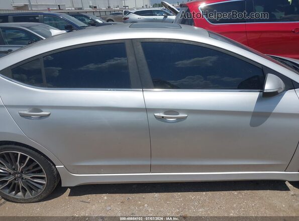 KMHD04LB1JU518632 2018 HYUNDAI ELANTRA Silver Widok wnętrza z tyłu