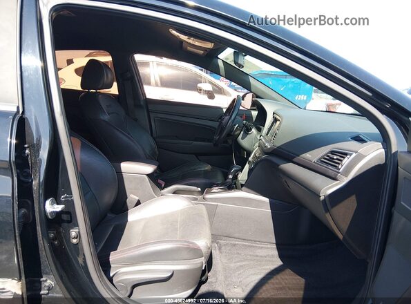 KMHD04LBXHU345333 2017 HYUNDAI ELANTRA Black Widok wnętrza z przodu
