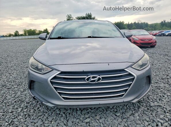 KMHD74LF0JU557243 2018 HYUNDAI ELANTRA Gray Front view