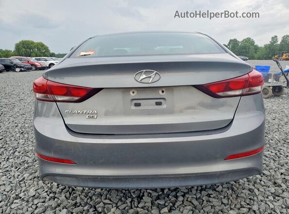 KMHD74LF0JU557243 2018 HYUNDAI ELANTRA Gray Rear view