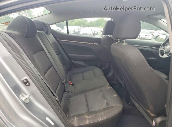 KMHD74LF0JU557243 2018 HYUNDAI ELANTRA Gray Rear seats view