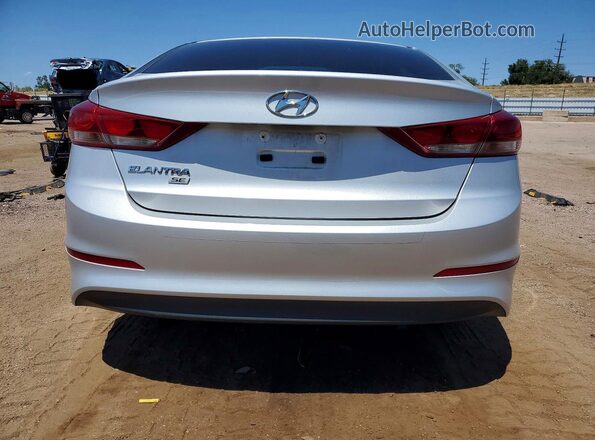 KMHD74LF2JU611626 2018 HYUNDAI ELANTRA Silver Vista trasera
