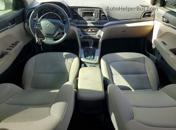 KMHD74LFXJU594557 2018 HYUNDAI ELANTRA Бежевый Вид панели приборов
