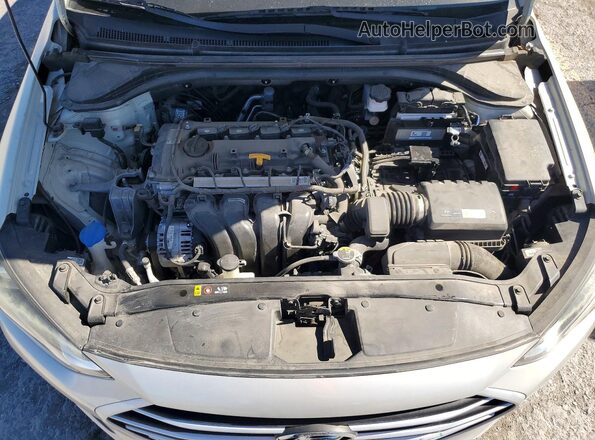 KMHD74LFXJU594557 2018 HYUNDAI ELANTRA Бежевый Вид задней части салона