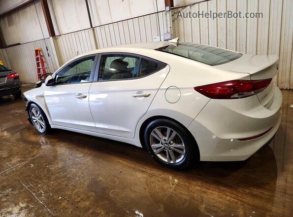 KMHD84LF1HU102599 2017 HYUNDAI ELANTRA Beige Trasero izquierdo