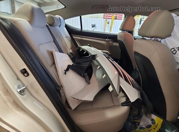 KMHD84LF1HU102599 2017 HYUNDAI ELANTRA Beige Vista de los asientos traseros