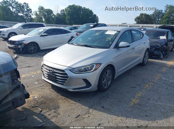 KMHD84LF4JU718061 2018 HYUNDAI ELANTRA Silver Vista tres cuartos delantera izquierda