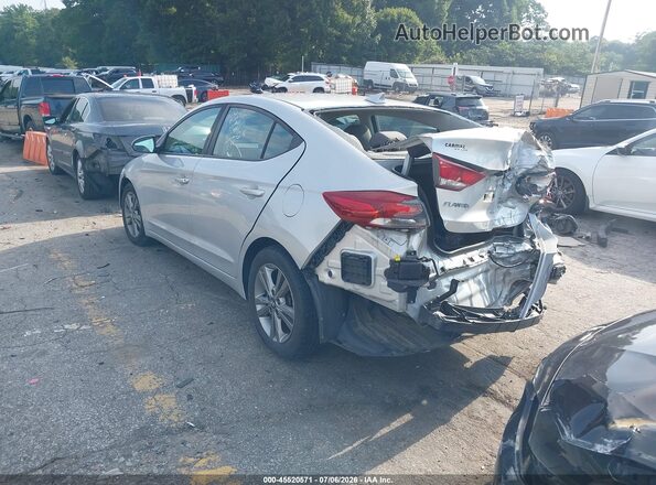 KMHD84LF4JU718061 2018 HYUNDAI ELANTRA Silver Trasero izquierdo