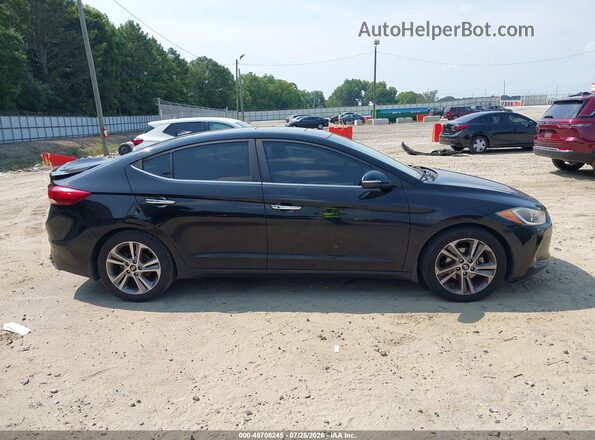 KMHD84LF5HU182909 2017 HYUNDAI ELANTRA Black Սալոնի հետևի տեսք