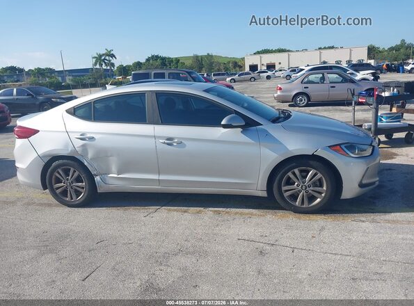 KMHD84LF6JU572150 2018 HYUNDAI ELANTRA Silver Widok wnętrza z tyłu