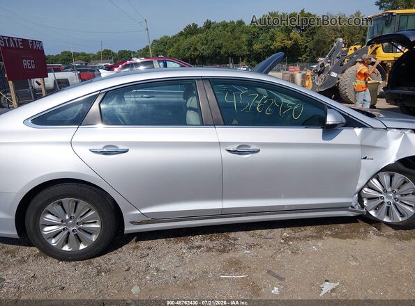 KMHE24L19GA015866 2016 HYUNDAI SONATA HYBRID Silver Vista interior trasera