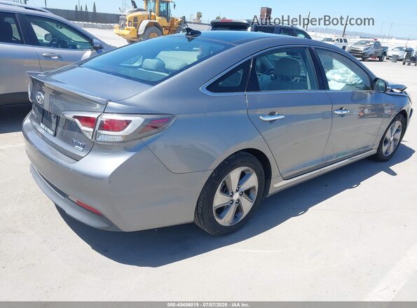 KMHE34L11HA056569 2017 HYUNDAI SONATA HYBRID Silver Trasero derecho