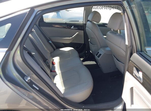 KMHE34L11HA056569 2017 HYUNDAI SONATA HYBRID Silver Vista de la etiqueta del VIN