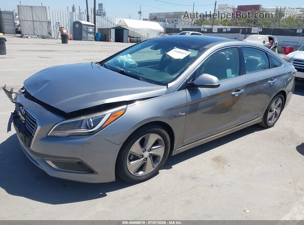 KMHE34L11HA056569 2017 HYUNDAI SONATA HYBRID Silver Vista tres cuartos delantera izquierda