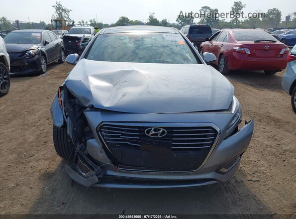 KMHE34L15GA017983 2016 HYUNDAI SONATA HYBRID Silver Rear interior view
