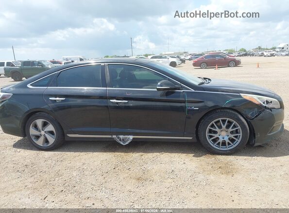 KMHE34L15GA018129 2016 HYUNDAI SONATA HYBRID Black Вид задньої частини салону