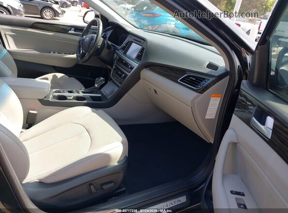 KMHE34L1XGA028185 2016 HYUNDAI SONATA HYBRID Black Вид салону спереду