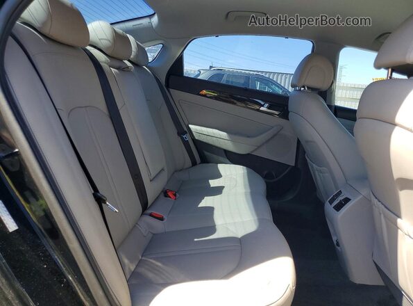 KMHE34L31HA077214 2017 HYUNDAI SONATA Black Vista de los asientos traseros