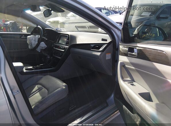 KMHE34L36KA090659 2019 HYUNDAI SONATA HYBRID Gray Widok wnętrza z przodu