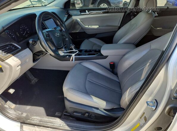 KMHE34L37HA072499 2017 HYUNDAI SONATA Silver Vista interior delantera