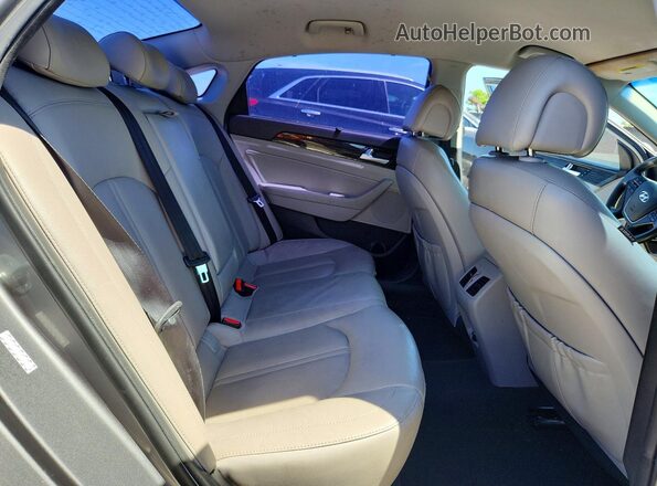 KMHE34L3XHA069211 2017 HYUNDAI SONATA Gray Vista de los asientos traseros