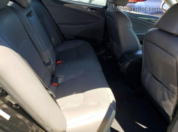 KMHEC4A43DA097471 2024 HYUNDAI SONATA Black Vista de los asientos traseros