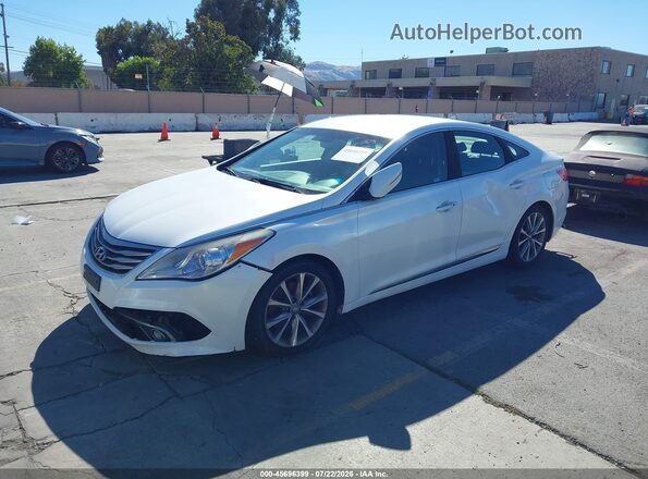 KMHFG4JG0GA501141 2016 HYUNDAI AZERA White Vista tres cuartos delantera izquierda