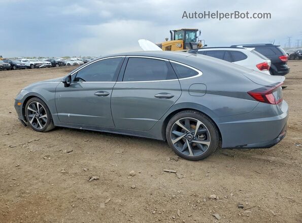 KMHL44J23PA311253 2023 HYUNDAI SONATA Gray Trasero izquierdo