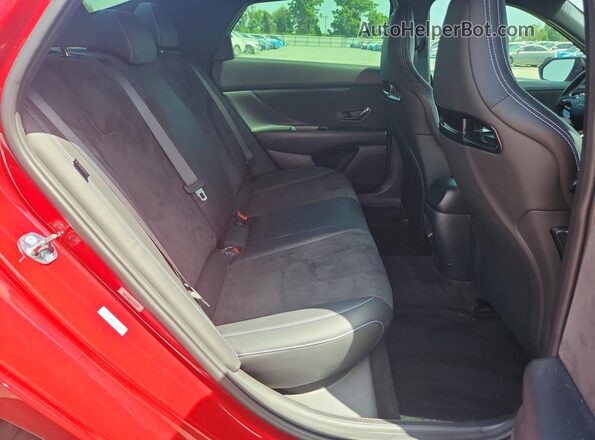 KMHLW4DK0TU036357 2026 HYUNDAI ELANTRA Red Rear seats view